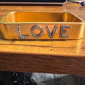 Tory Burch Gold Hinged Cuff Bracelet – “LOVE” Crystal Detail